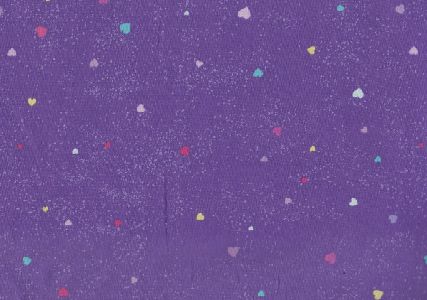 Stoff in Lila mit Herzchen Muster