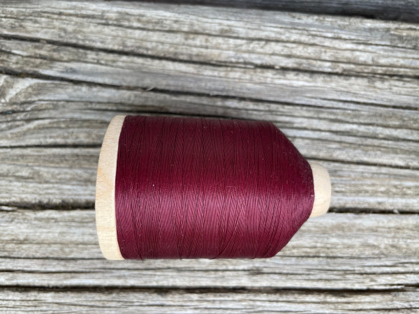 Handquilktgarn von Yli auf großen Holzspule