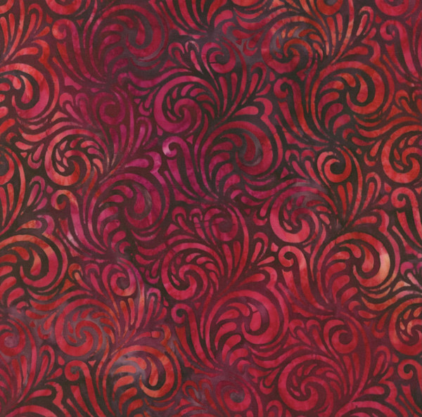 Ein wunderschöne, dunkelrote Batikstoff mit schwungvollen Muster.